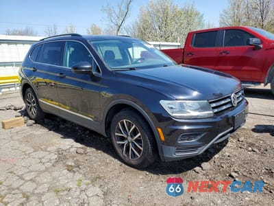 Czwarte zdjęcie samochodu z boku: 2018 VOLKSWAGEN TIGUAN SE VIN:3VV2B7AX2JM191508 - miniatura