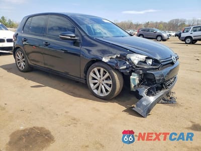 Czwarte zdjęcie samochodu z boku: 2013 VOLKSWAGEN GOLF VIN:WVWDM7AJ8DW038696 - miniatura