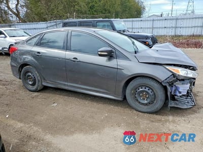 Czwarte zdjęcie samochodu z boku: 2016 FORD FOCUS SE VIN:1FADP3F24GL291978 - miniatura