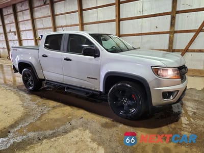 Czwarte zdjęcie samochodu z boku: 2018 CHEVROLET COLORADO LT VIN:1GCGTCEN9J1106776 - miniatura
