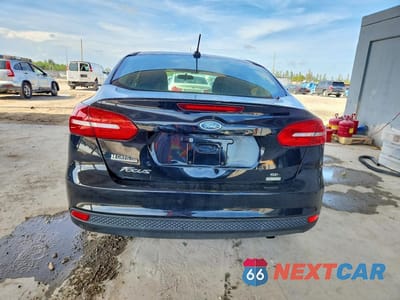 Zdjęcie 6 z 12 samochodu: 2018 FORD FOCUS SE VIN:1FADP3FEXJL247131 - miniatura