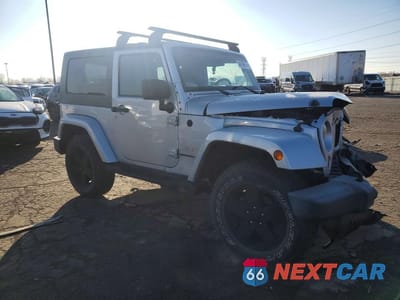 Czwarte zdjęcie samochodu z boku: 2009 JEEP WRANGLER SAHARA VIN:1J4FA54119L701529 - miniatura