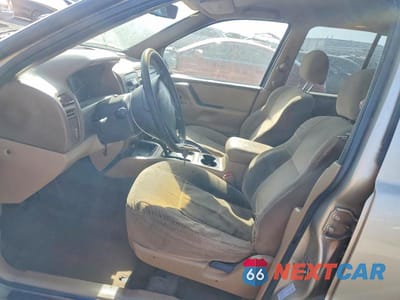 Zdjęcie 7 z 13 samochodu: 2000 JEEP GRAND CHEROKEE LAREDO VIN:1J4GW48S0YC388328 - miniatura