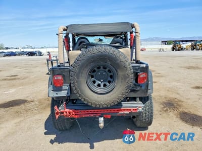 Zdjęcie 6 z 12 samochodu: 1997 JEEP WRANGLER / TJ SAHARA VIN:1J4FY49S4VP520144 - miniatura