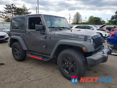 Czwarte zdjęcie samochodu z boku: 2017 JEEP WRANGLER SPORT VIN:1C4AJWAG5HL598810 - miniatura