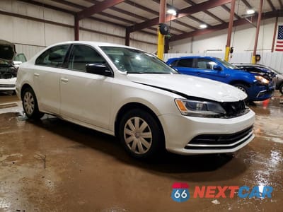 Czwarte zdjęcie samochodu z boku: 2016 VOLKSWAGEN JETTA S VIN:3VW167AJ5GM293482 - miniatura