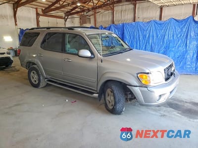 Czwarte zdjęcie samochodu z boku: 2002 TOYOTA SEQUOIA SR5 VIN:5TDBT44A12S122151 - miniatura