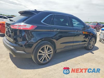 Trzecie zdjęcie samochodu z tyłu: 2020 FORD EDGE TITANIUM VIN:2FMPK3K91LBB15727 - miniatura