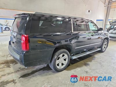 Trzecie zdjęcie samochodu z tyłu: 2018 CHEVROLET SUBURBAN K1500 LT VIN:1GNSKHKC5JR280849 - miniatura