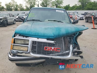 Piąte zdjęcie samochodu w środku: 1995 GMC SIERRA K1500 VIN:2GTEK19K3S1580989 - miniatura