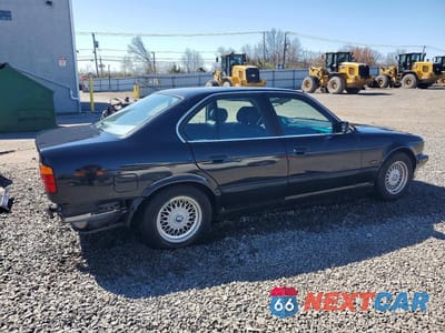 Trzecie zdjęcie samochodu z tyłu: 1995 BMW 525 I VIN:WBAHD5325SGB37785 - miniatura