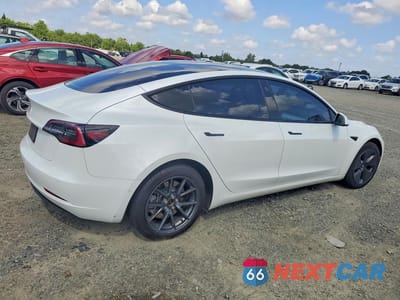 Trzecie zdjęcie samochodu z tyłu: 2021 TESLA MODEL 3 VIN:5YJ3E1EA7MF059236 - miniatura