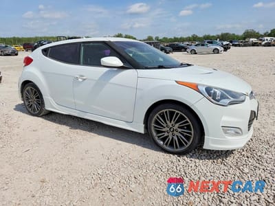 Czwarte zdjęcie samochodu z boku: 2013 HYUNDAI VELOSTER RE MIX VIN:KMHTC6AD4DU134075 - miniatura