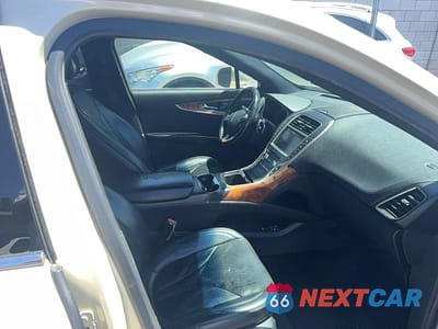 Piąte zdjęcie samochodu w środku: 2016 LINCOLN MKX RESERVE VIN:2LMPJ8LP8GBL40590 - miniatura
