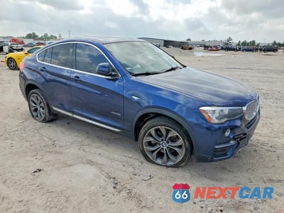 Czwarte zdjęcie samochodu z boku: 2015 BMW X4 XDRIVE35I VIN:5UXXW5C53F0E87822 - miniatura