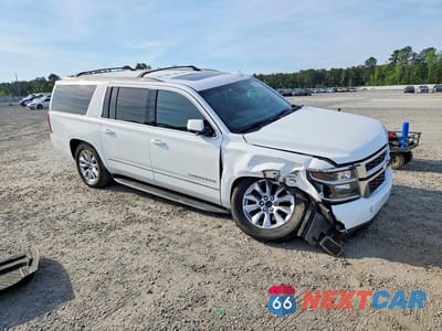 Czwarte zdjęcie samochodu z boku: 2019 CHEVROLET SUBURBAN K1500 LT VIN:1GNSKHKCXKR148090 - miniatura