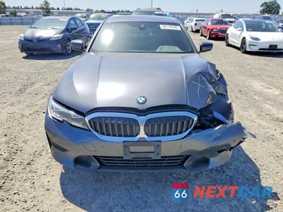 Piąte zdjęcie samochodu w środku: 2021 BMW 330I VIN:3MW5R1J05M8B59976 - miniatura