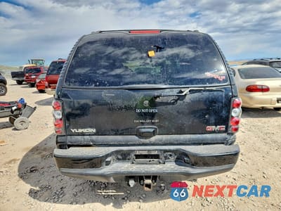 Zdjęcie 6 z 11 samochodu: 2003 GMC YUKON DENALI VIN:1GKEK63U83J327489 - miniatura