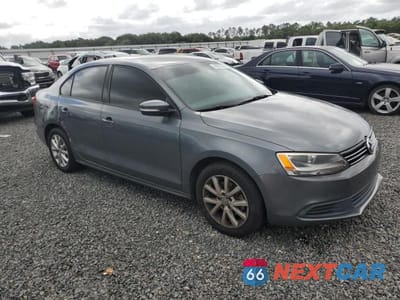 Czwarte zdjęcie samochodu z boku: 2011 VOLKSWAGEN JETTA SE VIN:3VWDX7AJXBM109382 - miniatura