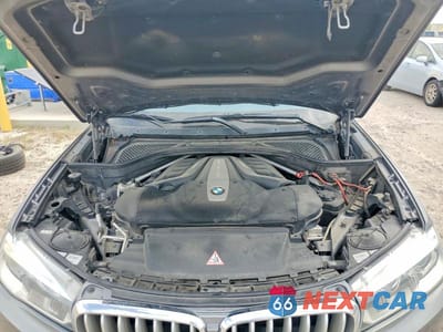 Zdjęcie 11 z 12 samochodu: 2014 BMW X5 XDRIVE50I VIN:5UXKR6C50E0C03214 - miniatura