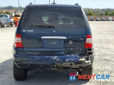 Zdjęcie 6 z 13 samochodu: 2002 MERCEDES-BENZ ML 500 VIN:4JGAB75E92A323547 - miniatura