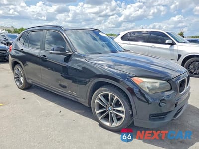 Czwarte zdjęcie samochodu z boku: 2014 BMW X1 SDRIVE28I VIN:WBAVM1C52EVW51676 - miniatura