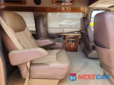 Zdjęcie 10 z 12 samochodu: 1997 FORD ECONOLINE E150 VAN VIN:1FDEE14L5VHA86122 - miniatura