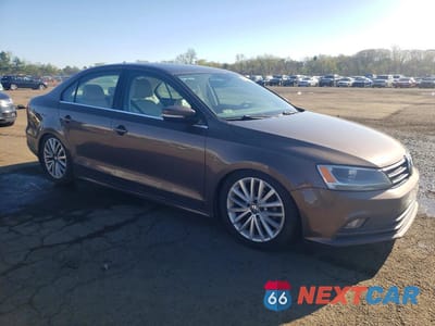 Czwarte zdjęcie samochodu z boku: 2016 VOLKSWAGEN JETTA SEL VIN:3VWL17AJXGM203430 - miniatura