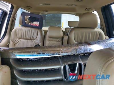 Zdjęcie 10 z 13 samochodu: 2010 HONDA ODYSSEY EXL VIN:5FNRL3H78AB028391 - miniatura
