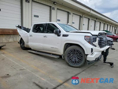 Czwarte zdjęcie samochodu z boku: 2022 GMC SIERRA K1500 DENALI ULTIMATE VIN:1GTUUHETXNZ559971 - miniatura