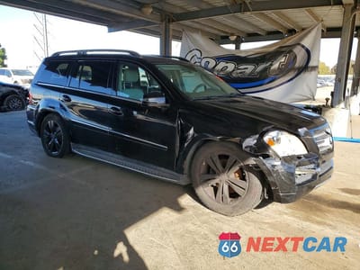 Czwarte zdjęcie samochodu z boku: 2012 MERCEDES-BENZ GL 450 4MATIC VIN:4JGBF7BE4CA782578 - miniatura