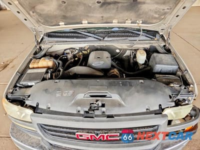 Zdjęcie 11 z 12 samochodu: 2004 GMC SIERRA VIN:1GTHC29U24E387428 - miniatura