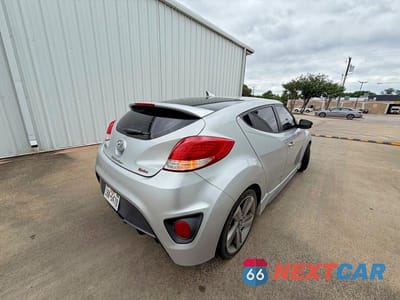 Czwarte zdjęcie samochodu z boku: 2014 HYUNDAI VELOSTER TURBO VIN:KMHTC6AE3EU184542 - miniatura