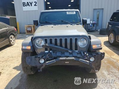 Piąte zdjęcie samochodu w środku: 2019 JEEP WRANGLER UNLIMITED SAHARA VIN:1C4HJXEN2KW506636 - miniatura