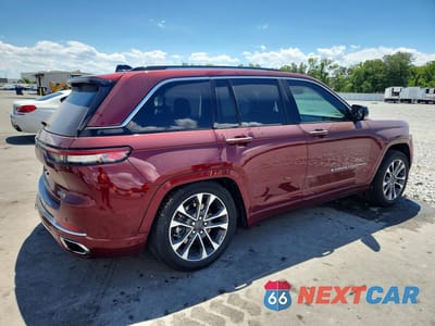 Trzecie zdjęcie samochodu z tyłu: 2023 JEEP GRAND CHEROKEE OVERLAND 4XE VIN:1C4RJYD66P8802212 - miniatura