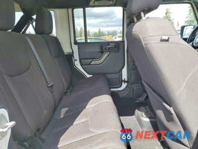 Zdjęcie 11 z 13 samochodu: 2013 JEEP WRANGLER UNLIMITED SPORT VIN:1C4HJWDG4DL553961 - miniatura