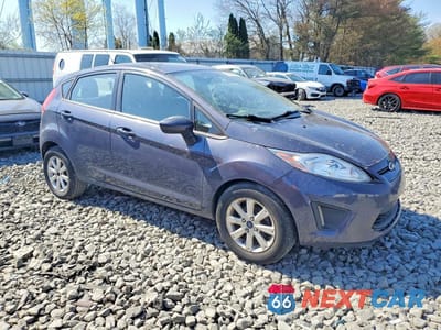 Czwarte zdjęcie samochodu z boku: 2013 FORD FIESTA SE VIN:3FADP4EJ9DM131488 - miniatura