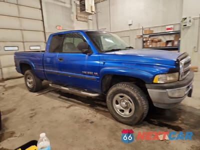 Czwarte zdjęcie samochodu z boku: 1999 DODGE RAM 1500 VIN:1B7HF13Z6XJ571479 - miniatura
