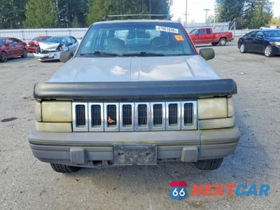 Piąte zdjęcie samochodu w środku: 1995 JEEP GRAND CHEROKEE LAREDO VIN:1J4GZ58S8SC563817 - miniatura