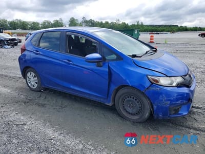 Czwarte zdjęcie samochodu z boku: 2016 HONDA FIT LX VIN:JHMGK5H52GX019087 - miniatura