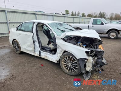 Czwarte zdjęcie samochodu z boku: 2016 VOLKSWAGEN JETTA SPORT VIN:3VWD17AJ4GM412747 - miniatura