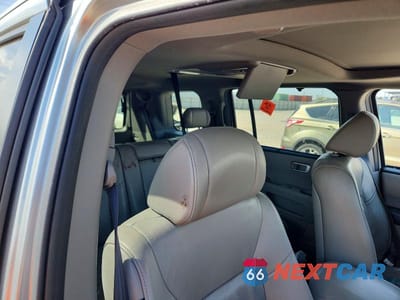 Zdjęcie 10 z 13 samochodu: 2011 HONDA PILOT TOURING VIN:5FNYF4H9XBB032454 - miniatura