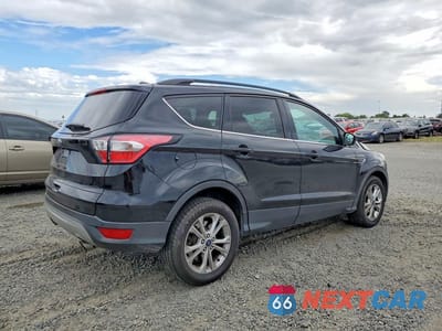 Trzecie zdjęcie samochodu z tyłu: 2017 FORD ESCAPE SE VIN:1FMCU0GD3HUC98442 - miniatura