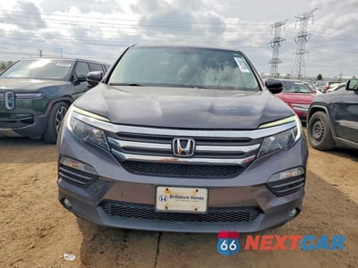 Piąte zdjęcie samochodu w środku: 2018 HONDA PILOT EXLN VIN:5FNYF6H74JB005713 - miniatura