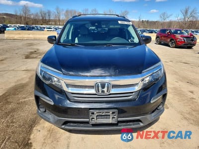 Piąte zdjęcie samochodu w środku: 2020 HONDA PILOT LX VIN:5FNYF6H11LB015615 - miniatura