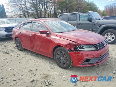 Czwarte zdjęcie samochodu z boku: 2017 VOLKSWAGEN JETTA S VIN:3VW2B7AJ1HM409035 - miniatura