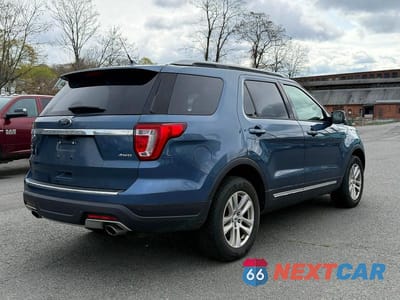 Czwarte zdjęcie samochodu z boku: 2018 FORD EXPLORER XLT VIN:1FM5K8D8XJGC81971 - miniatura