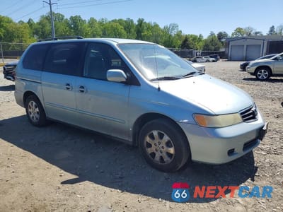 Czwarte zdjęcie samochodu z boku: 2004 HONDA ODYSSEY EXL VIN:5FNRL18004B135155 - miniatura