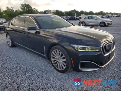 Czwarte zdjęcie samochodu z boku: 2022 BMW 740 I VIN:WBA7T2C00NCH54907 - miniatura