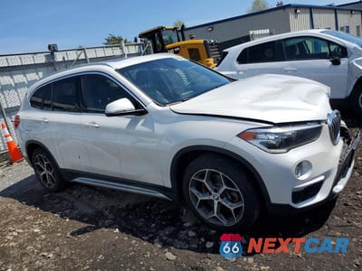 Czwarte zdjęcie samochodu z boku: 2018 BMW X1 XDRIVE28I VIN:WBXHT3C31J5L28455 - miniatura